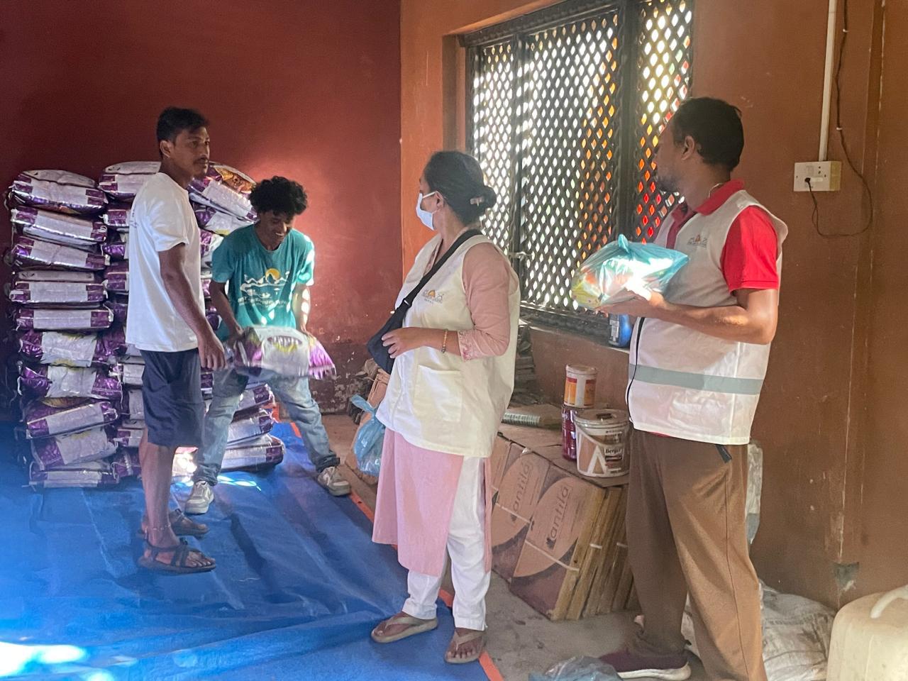Distribution of Daily used essentials to flood victims of  Dhading Benighat Community. Dhading.
